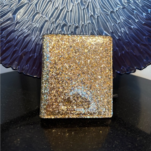 kate spade Handbags - Kate Spade Storybook Gold Glitter Compact Wallet